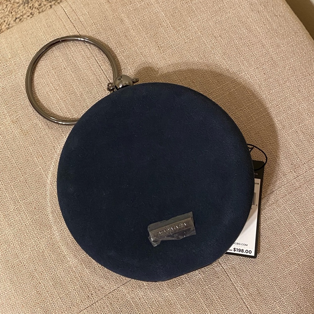 BCBG Maxazria navy blue suede purse, NWT and dust bag